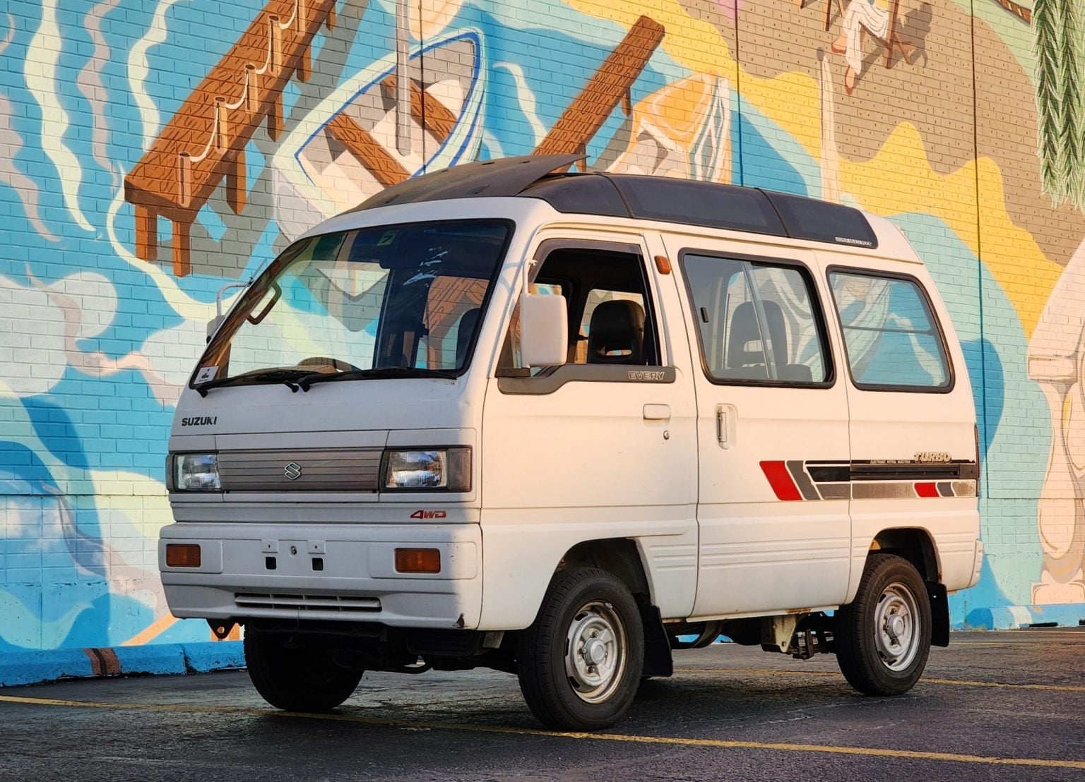 Mercedes Weikal with her 1989 Suzuki Every kei van from Japan